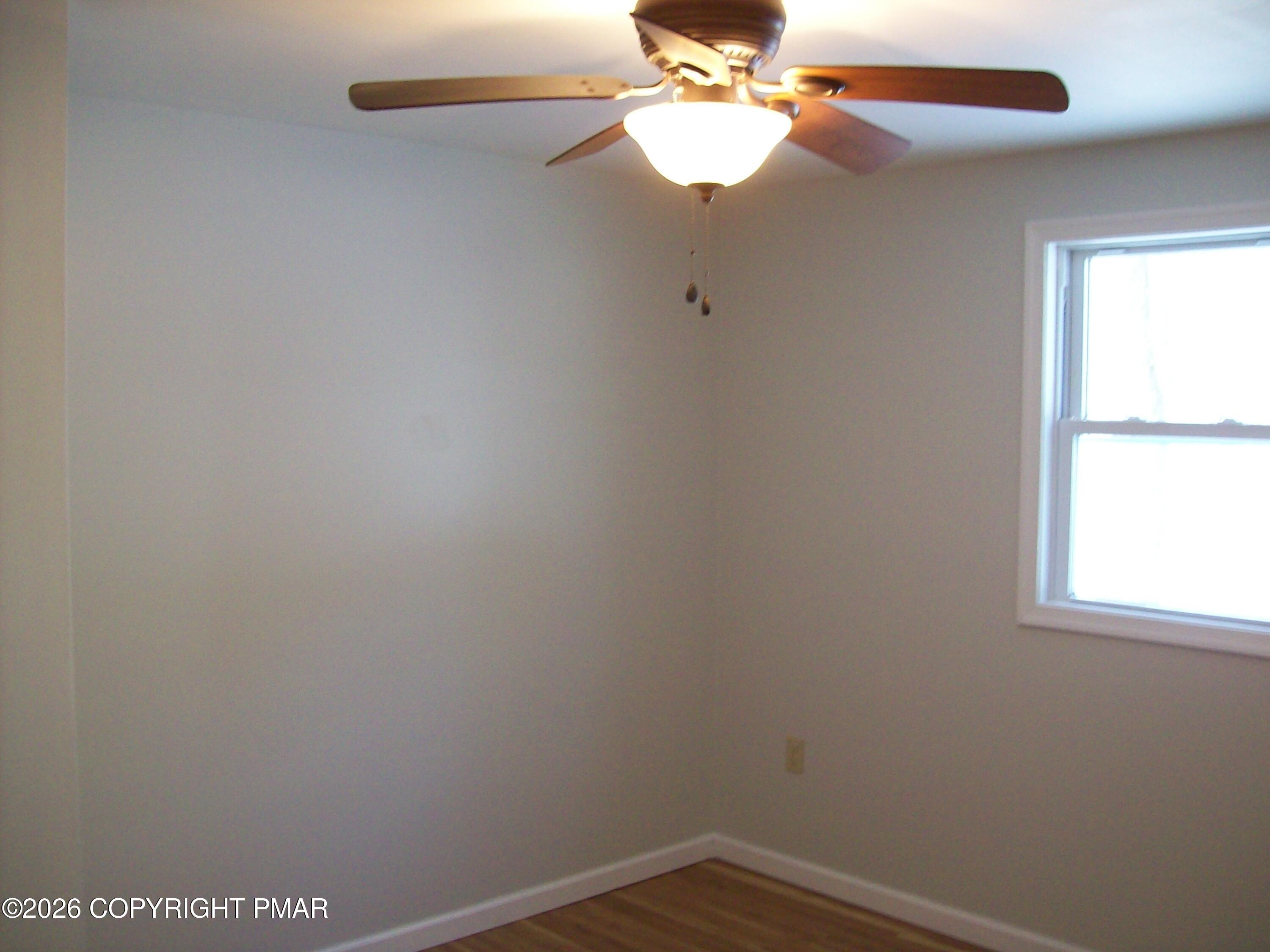 522 Apache Road East Stroudsburg, PA 18302 - Photo 12 of 23 an empty room with a window