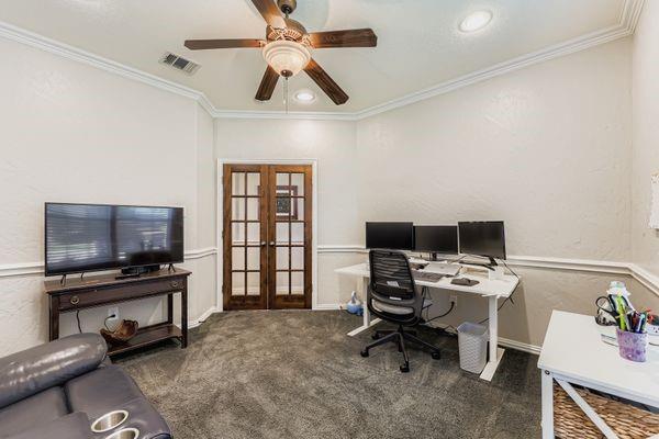 602 Christa Street Ovilla, TX 75154 - Photo 14 of 23 Office space with french doors, crown molding, dark colored carpet, a ceiling fan, and recessed lighting