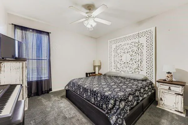 a large kitchen with a lot of counter top space and stainless steel appliances