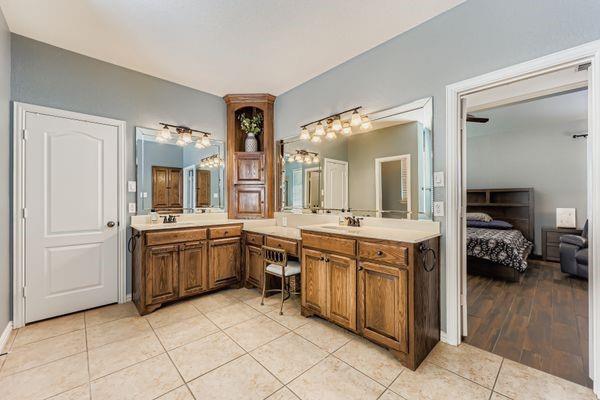 602 Christa Street Ovilla, TX 75154 - Photo 17 of 23 Ensuite bathroom featuring vanity and light tile patterned floors