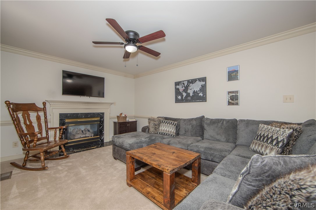 11360 Glendevon Road Chesterfield, VA 23838 - Photo 11 of 43 Family room featuring a gas fireplace, ceiling fan