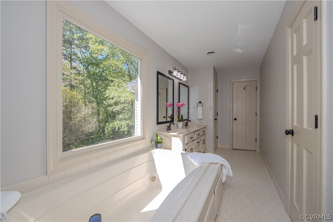 11360 Glendevon Road Chesterfield, VA 23838 - Photo 22 of 43 Primary bathroom featuring plenty of natural light