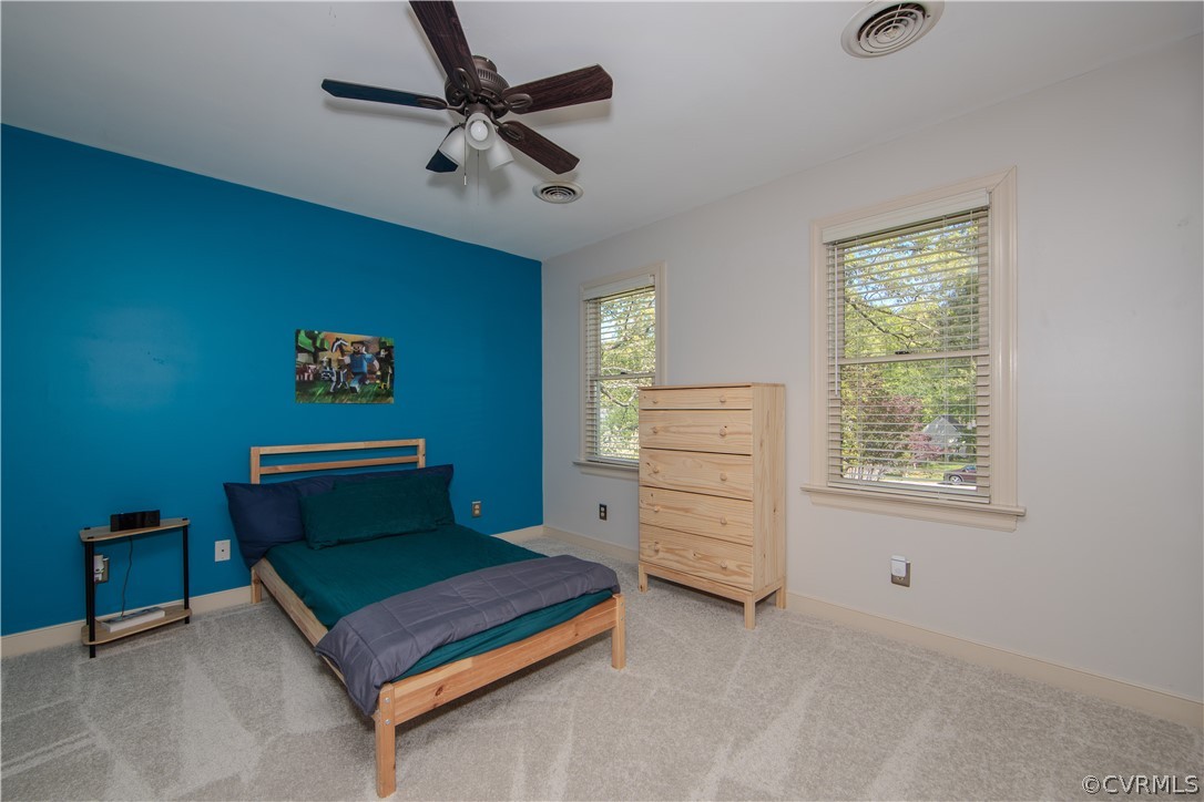 11360 Glendevon Road Chesterfield, VA 23838 - Photo 23 of 43 Bedroom 2 with ceiling fan and carpeted flooring!