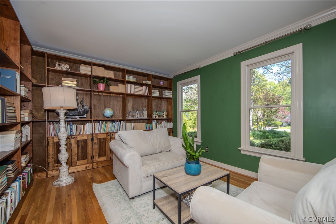 11360 Glendevon Road Chesterfield, VA 23838 - Photo 5 of 43 Living room featuring crown molding and hardwood f