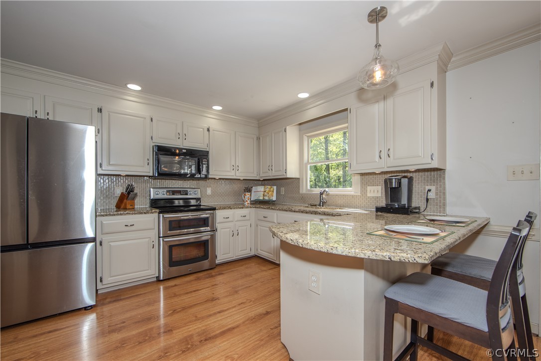 11360 Glendevon Road Chesterfield, VA 23838 - Photo 9 of 43 Kitchen with decorative light fixtures, recessed l