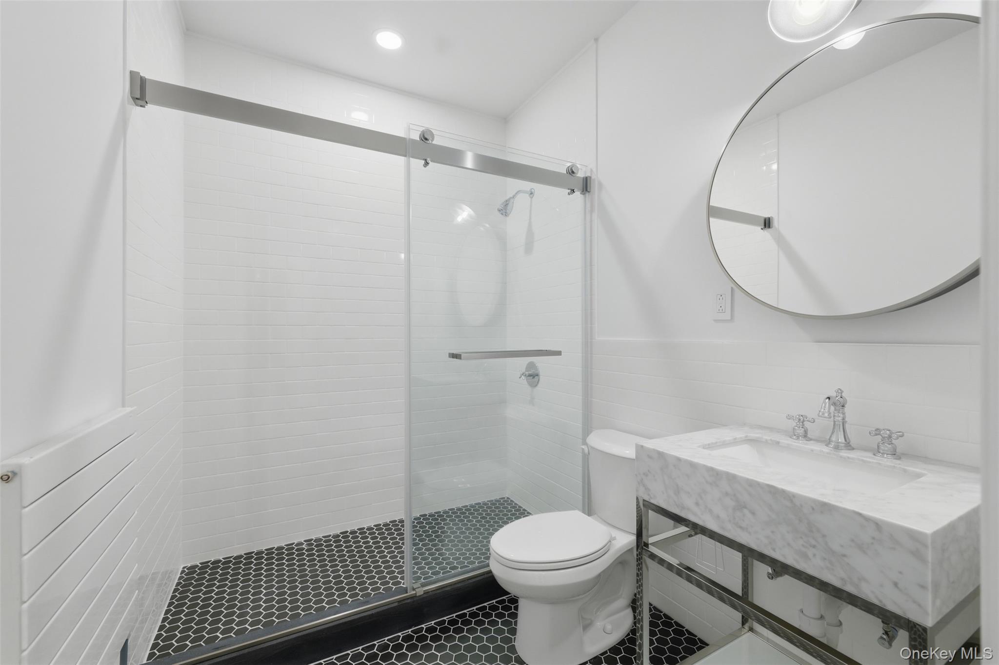 201 Main Street, Unit 2 Beacon, NY 12508 - Photo 14 of 24 Classic renovated bathroom with Glass Enclosed Shower