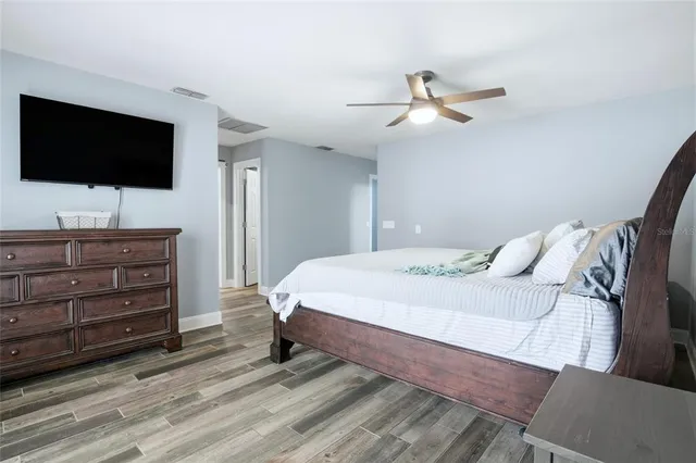 a bathroom with a sink a mirror and a shower