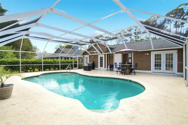 a large white bed in a white room
