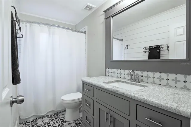 a view of a house with a garden