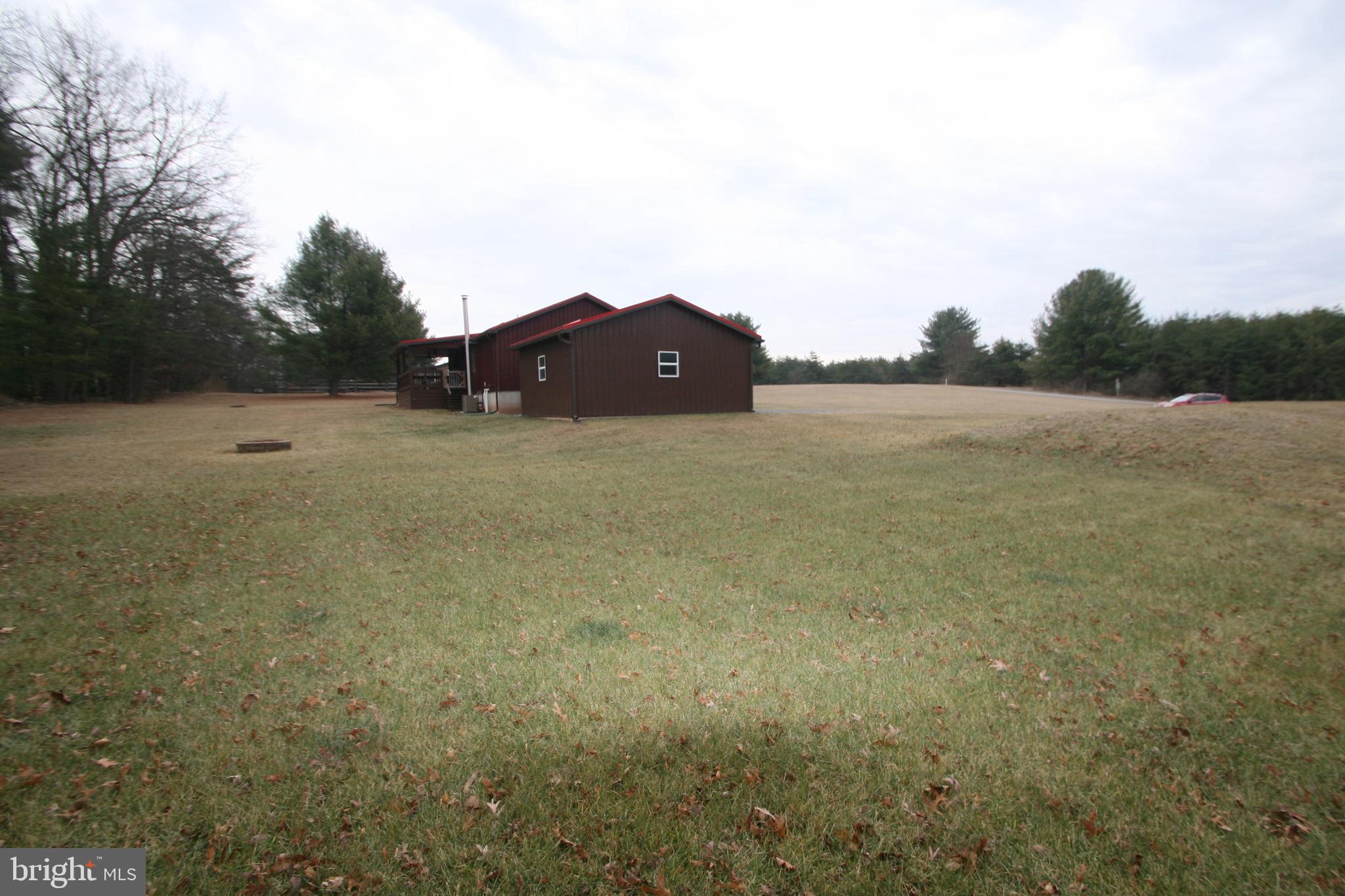 7565 Mountain View Drive Three Springs, PA 17264 - Photo 1 of 1 a view of a large mountain with a garden