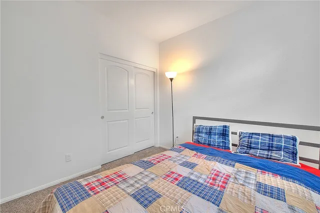 a bathroom with a toilet sink and vanity