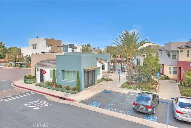 front view of a brick house with a yard