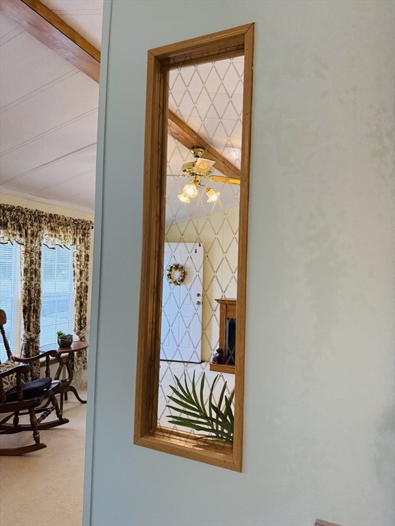 268 Palmer Road, Unit 44 Monson, MA 01057 - Photo 12 of 34 a view of sitting area in front of a door