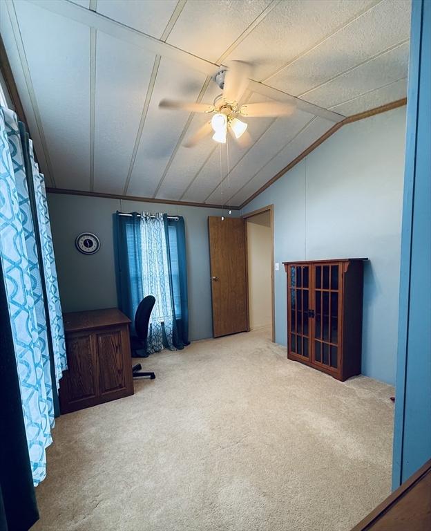 268 Palmer Road, Unit 44 Monson, MA 01057 - Photo 22 of 34 a view of livingroom with furniture and windows