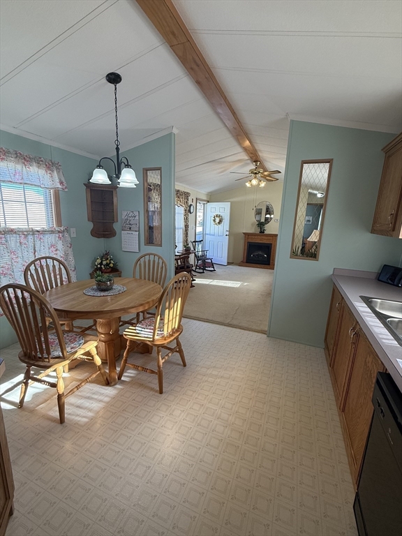 268 Palmer Road, Unit 44 Monson, MA 01057 - Photo 7 of 34 a dining room with furniture and wooden floor