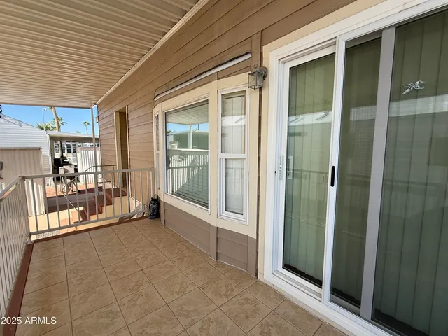 a view of an entryway with a balcony