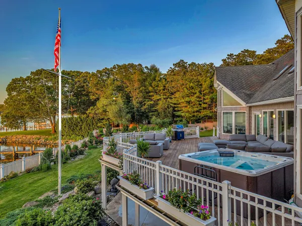a view of balcony with furniture
