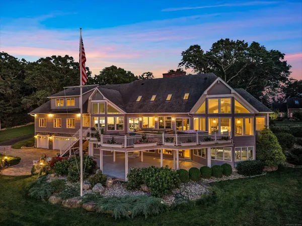 a view of a big building next to a yard