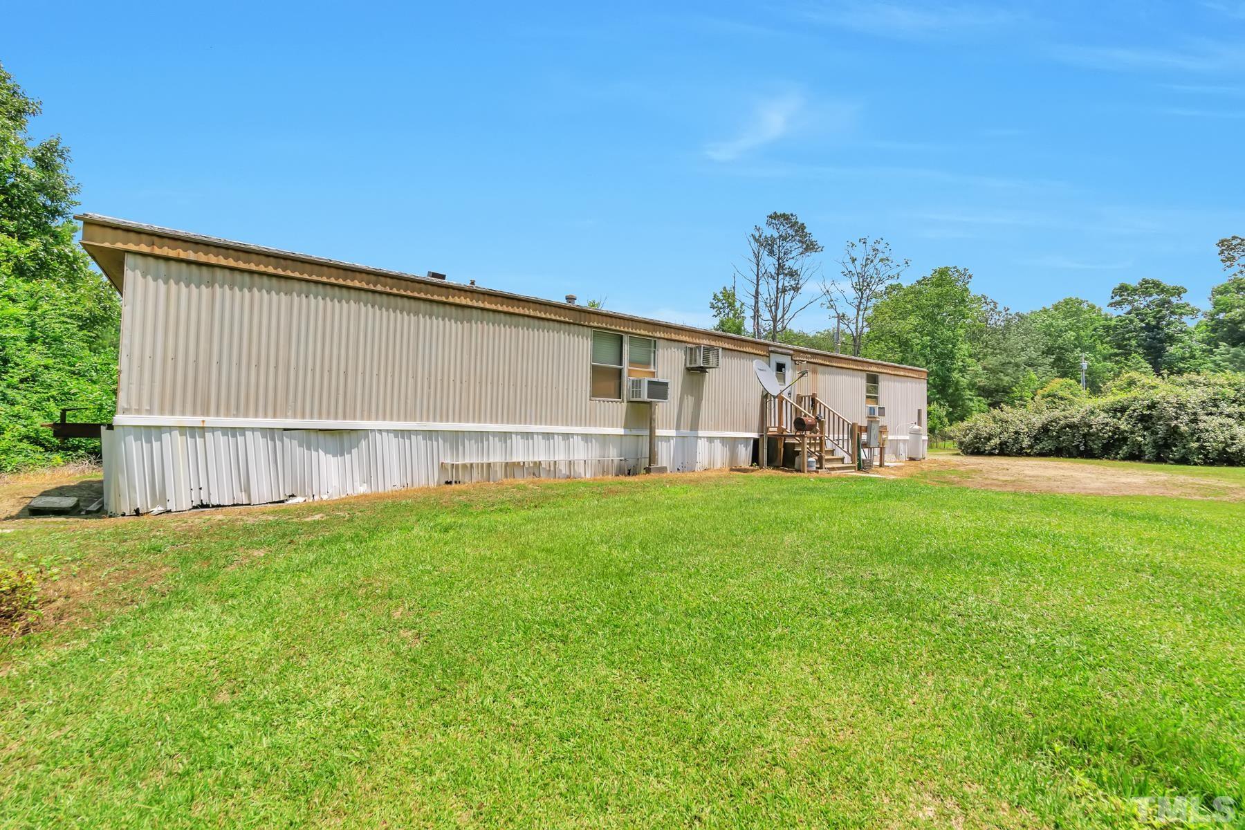 720 Whitley Road Middlesex, NC 27557 - Photo 25 of 25 a view of a house with a backyard