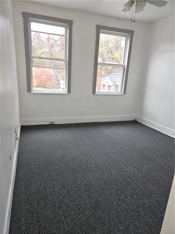 2215 Ardmore Boulevard Forest Hills, PA 15221 - Photo 4 of 8 an empty room with windows