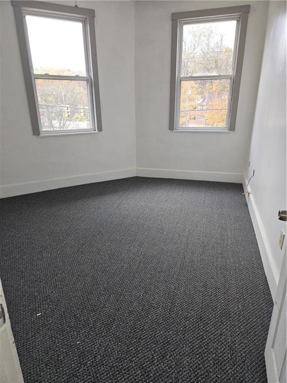 2215 Ardmore Boulevard Forest Hills, PA 15221 - Photo 5 of 8 an empty room with a window