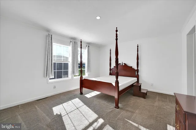 a living room with furniture and window