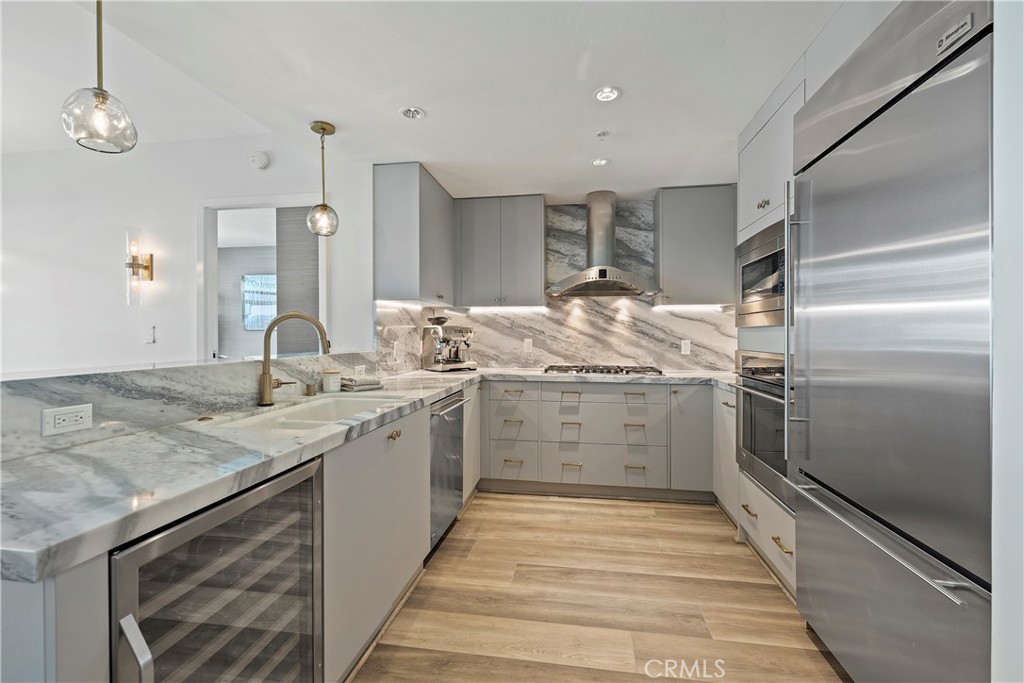 3141 Michelson Drive, Unit 907 Irvine, CA 92612 - Photo 11 of 48 a bathroom with a sink and a mirror