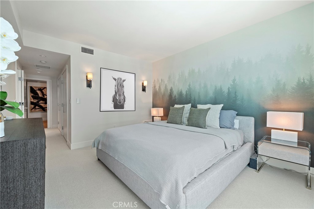 3141 Michelson Drive, Unit 907 Irvine, CA 92612 - Photo 18 of 48 a bedroom with a bed and a painting on the wall