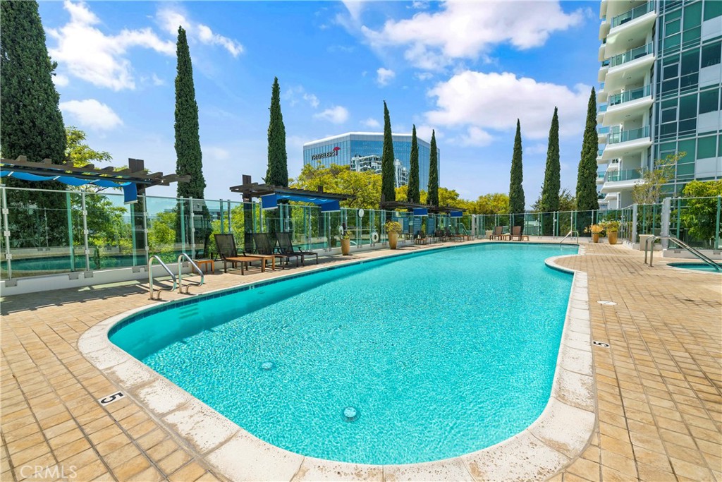 3141 Michelson Drive, Unit 907 Irvine, CA 92612 - Photo 45 of 48 a view of outdoor space swimming pool and lake view