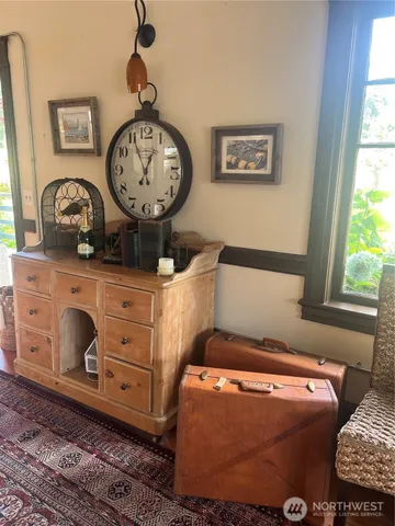 a room with furniture and a window