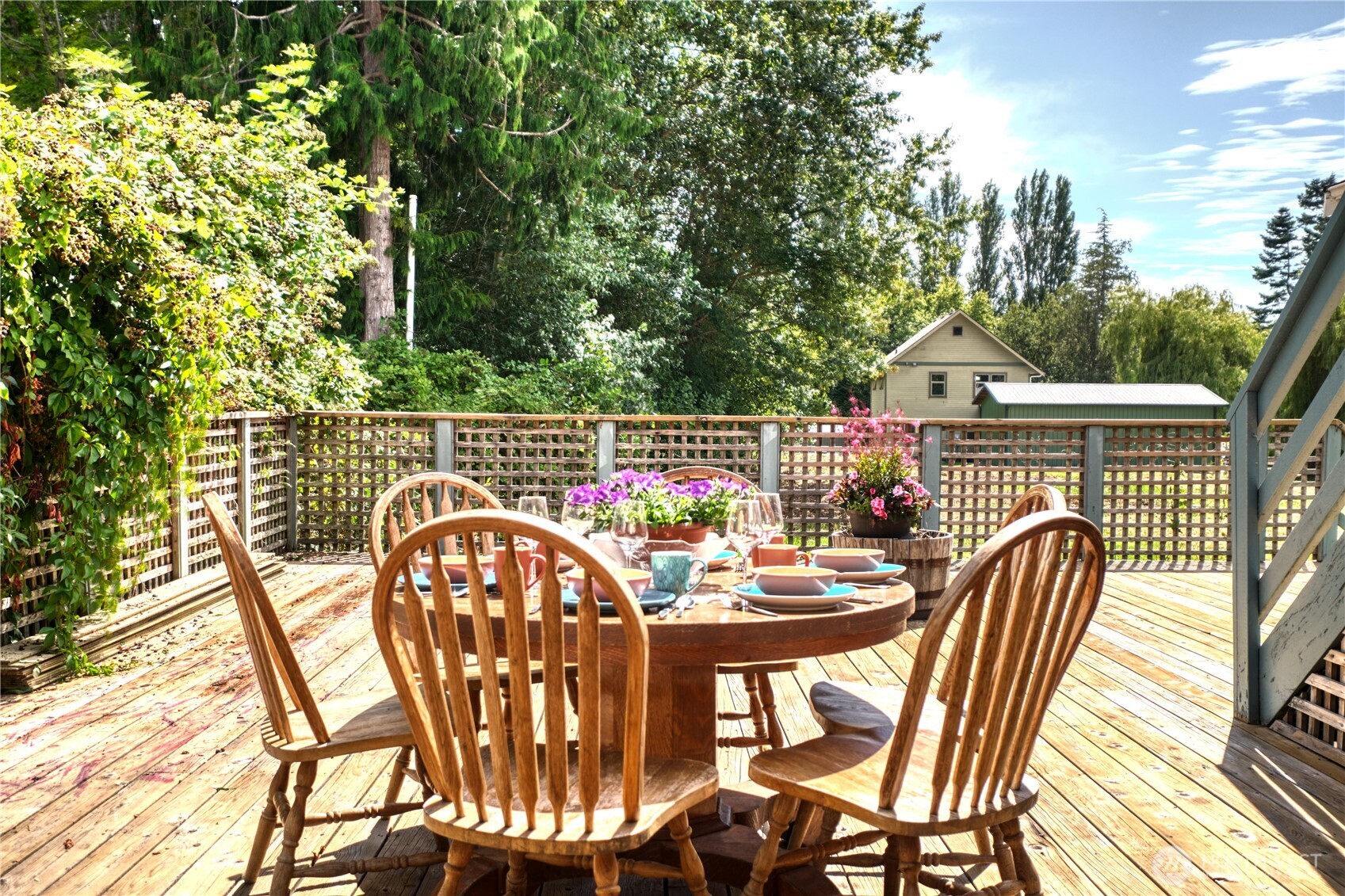 1379 Gulf Road Point Roberts, WA 98281 - Photo 20 of 37 a view of a chairs and table in the balcony