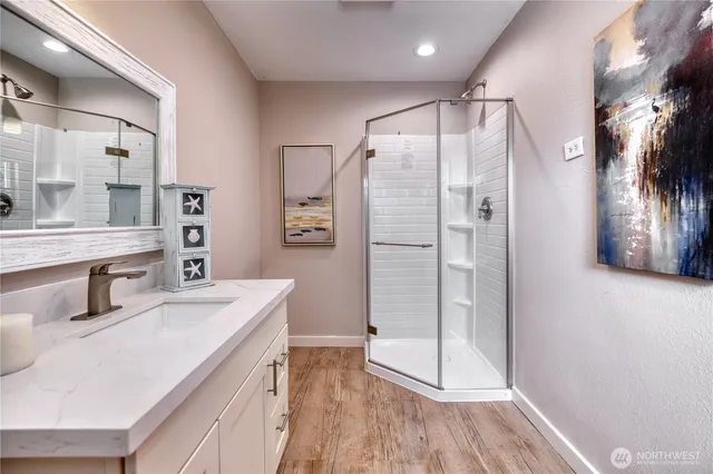 a bathroom with a sink and a mirror