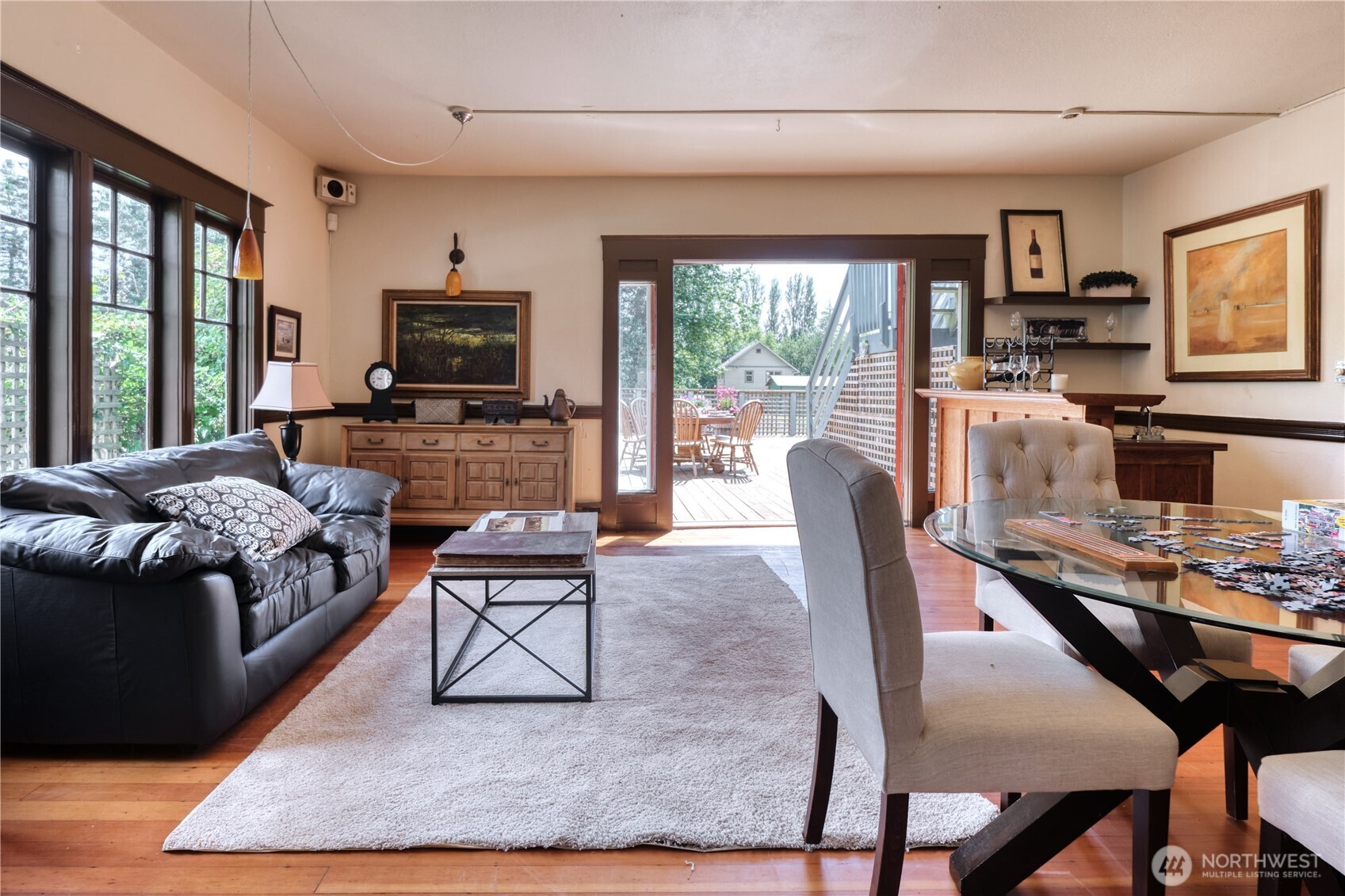 1379 Gulf Road Point Roberts, WA 98281 - Photo 29 of 37 a living room with fireplace furniture and a flat screen tv