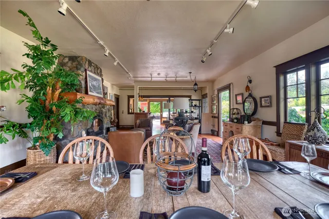 a view of a dining room with furniture window and outside view