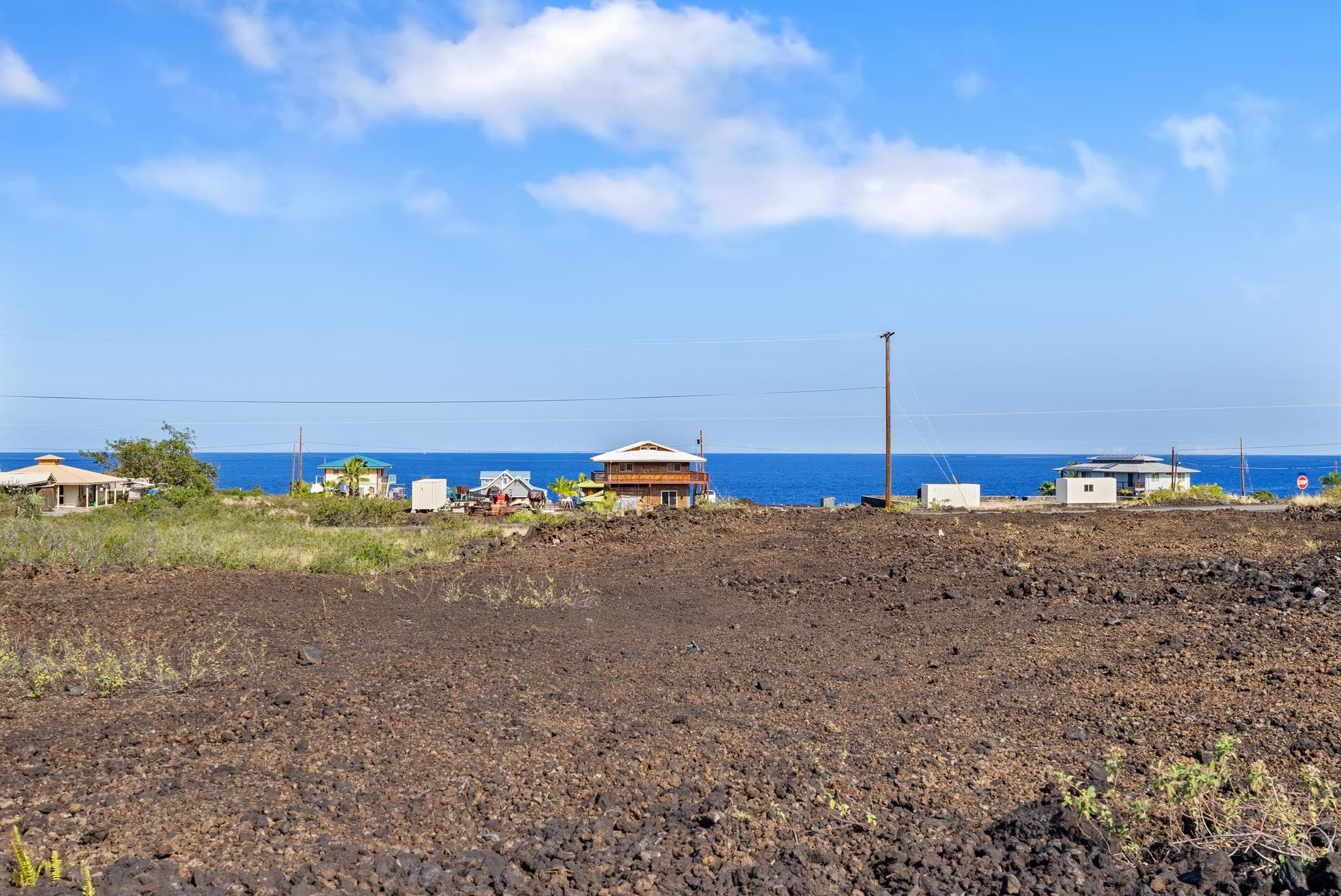 13 Ekolu Place Captain Cook, HI 96704 - Photo 5 of 13 a front view of a house with a yard