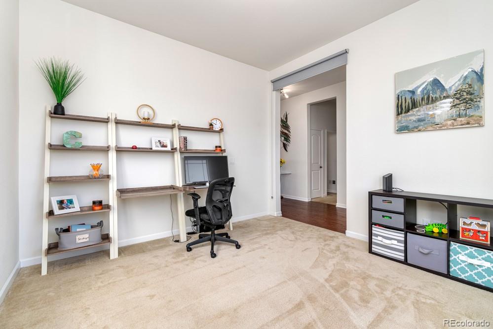 2944 Zephyr Road Fort Collins, CO 80528 - Photo 24 of 35 a view of a workspace with furniture