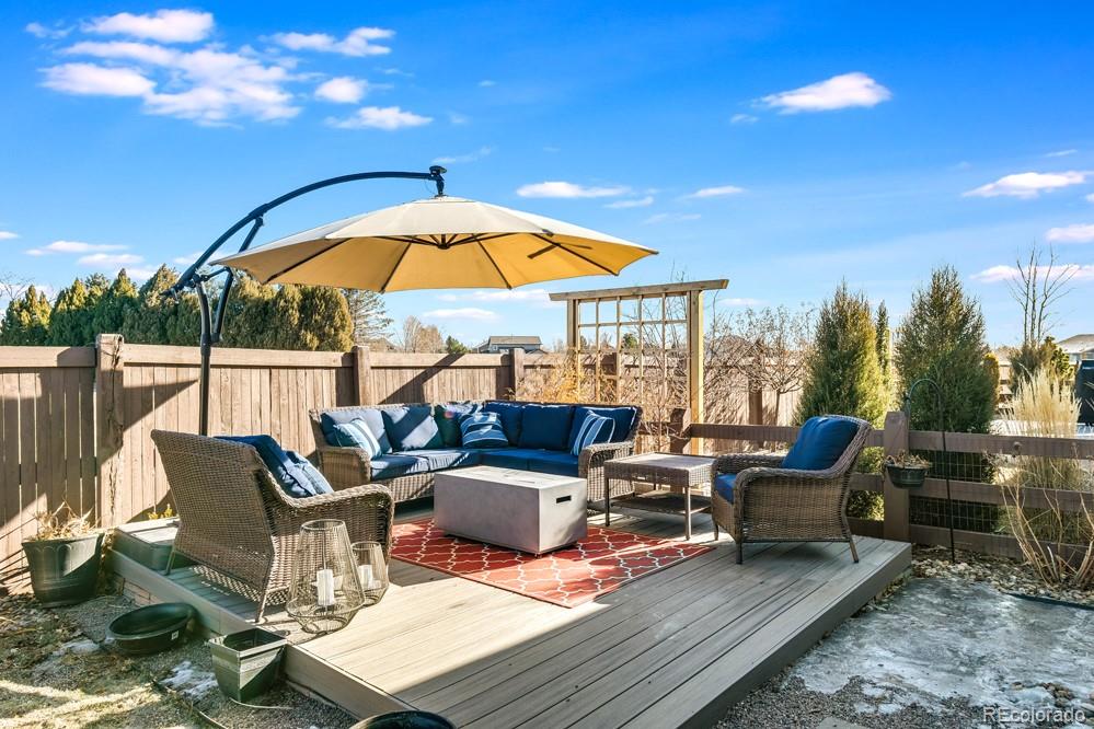 2944 Zephyr Road Fort Collins, CO 80528 - Photo 30 of 35 a outdoor space with patio the couches and pool view