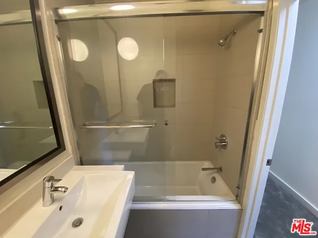a view of a kitchen with a sink and dishwasher