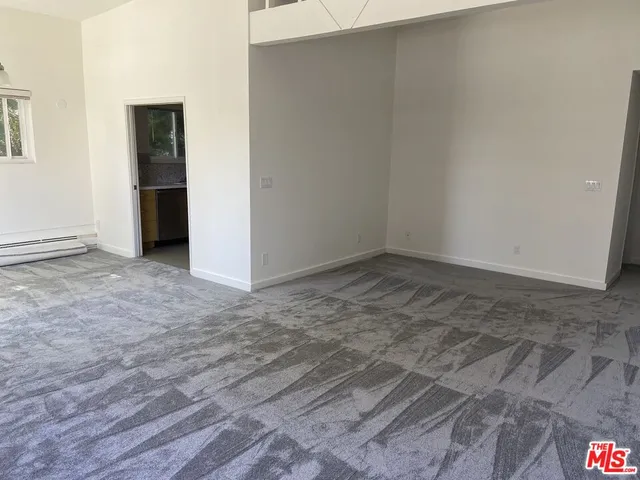 an empty room with an entryway