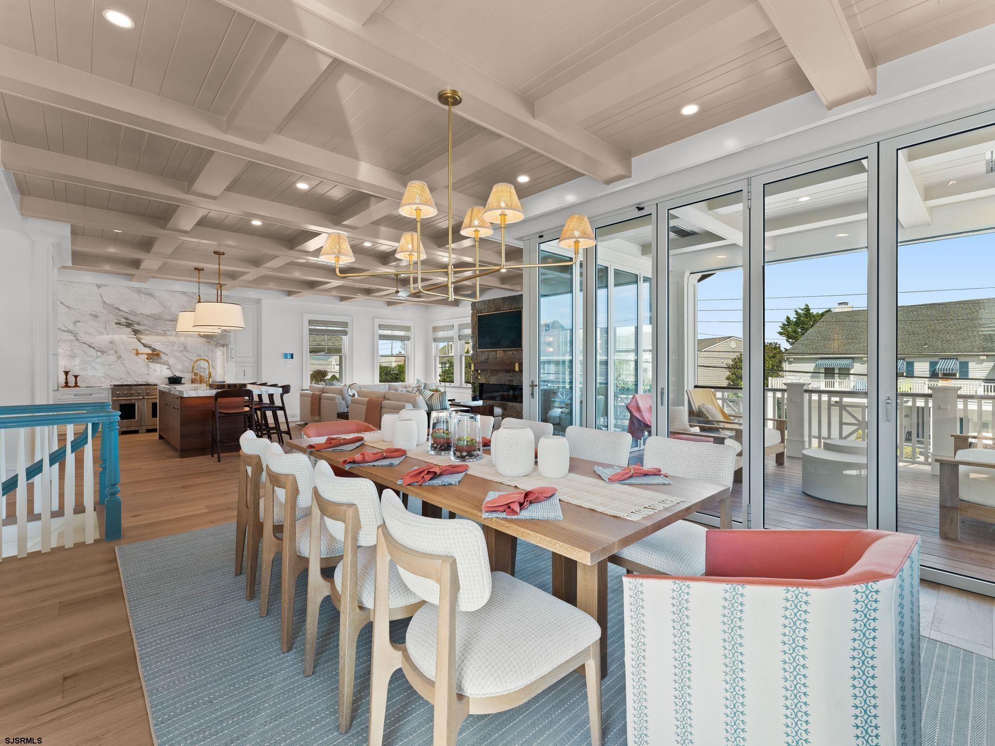 12 East Newcastle Road Ocean City, NJ 08226 - Photo 15 of 99 a view of a dining room with furniture window and outside view