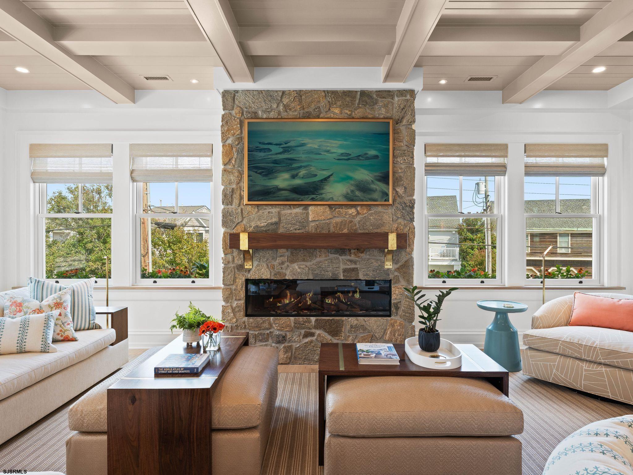 12 East Newcastle Road Ocean City, NJ 08226 - Photo 18 of 99 a living room with furniture large window and fireplace