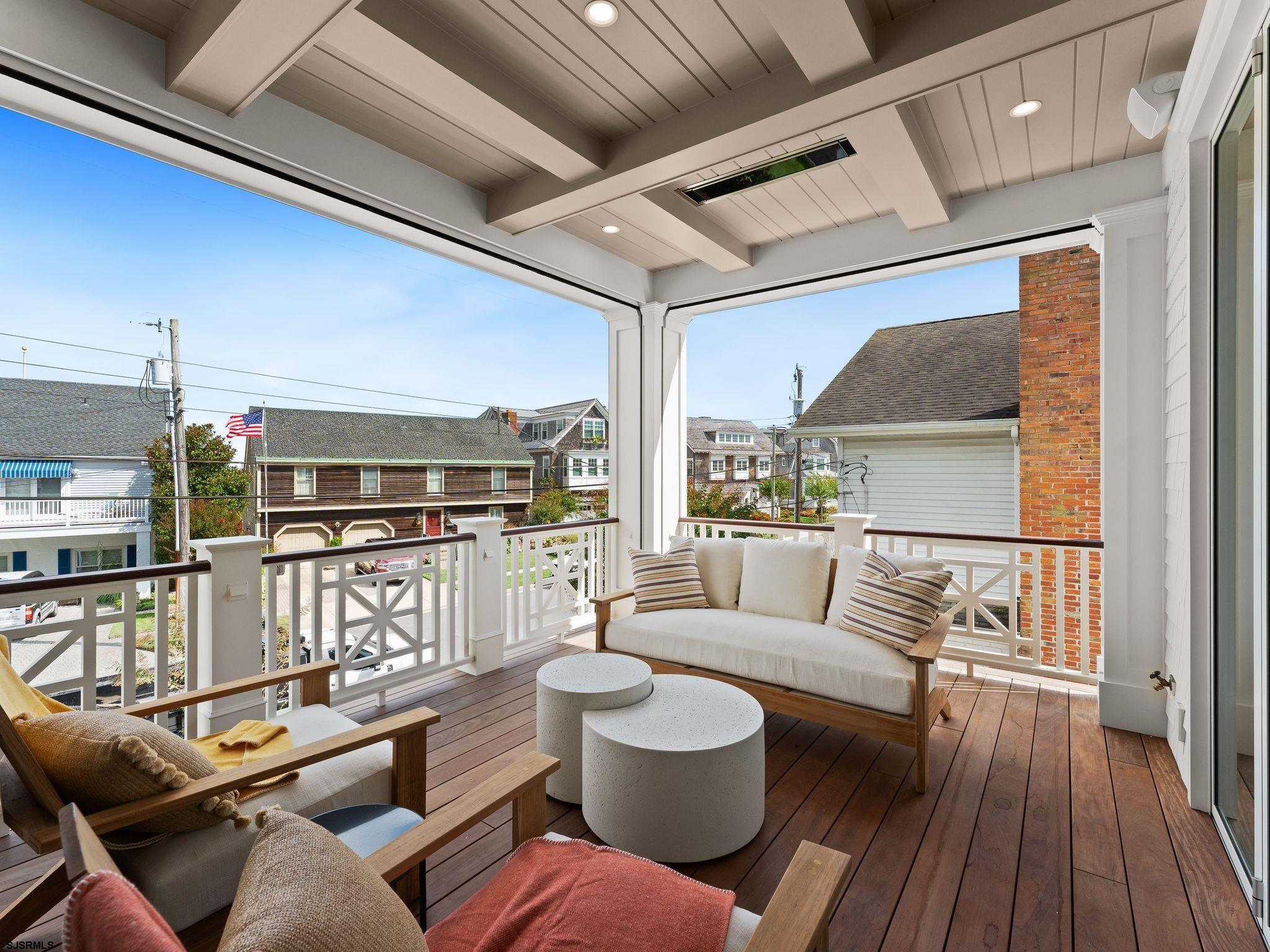 12 East Newcastle Road Ocean City, NJ 08226 - Photo 31 of 99 a living room with furniture and a wooden floor