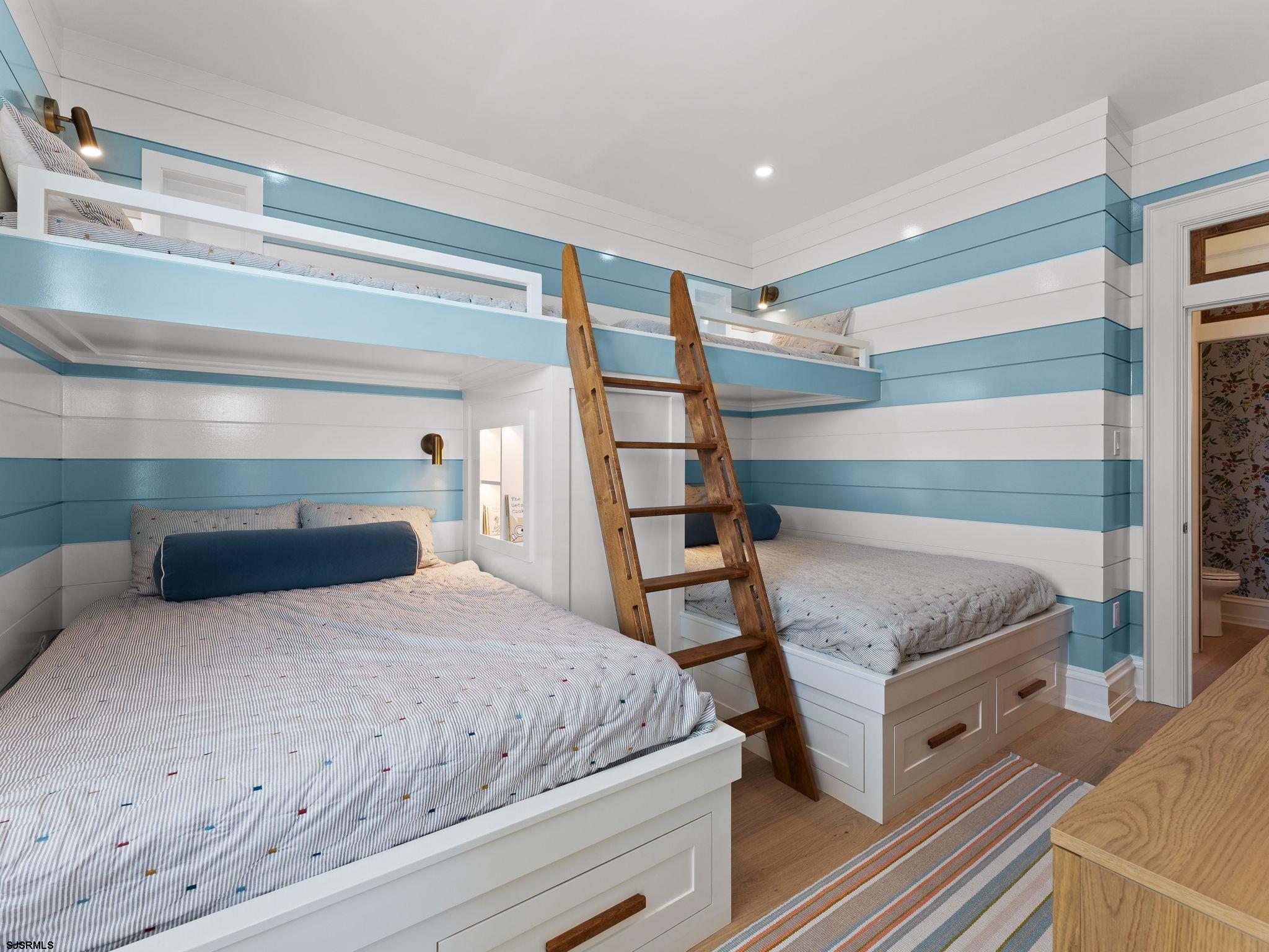 12 East Newcastle Road Ocean City, NJ 08226 - Photo 63 of 99 a bedroom with a bed and a cabinets