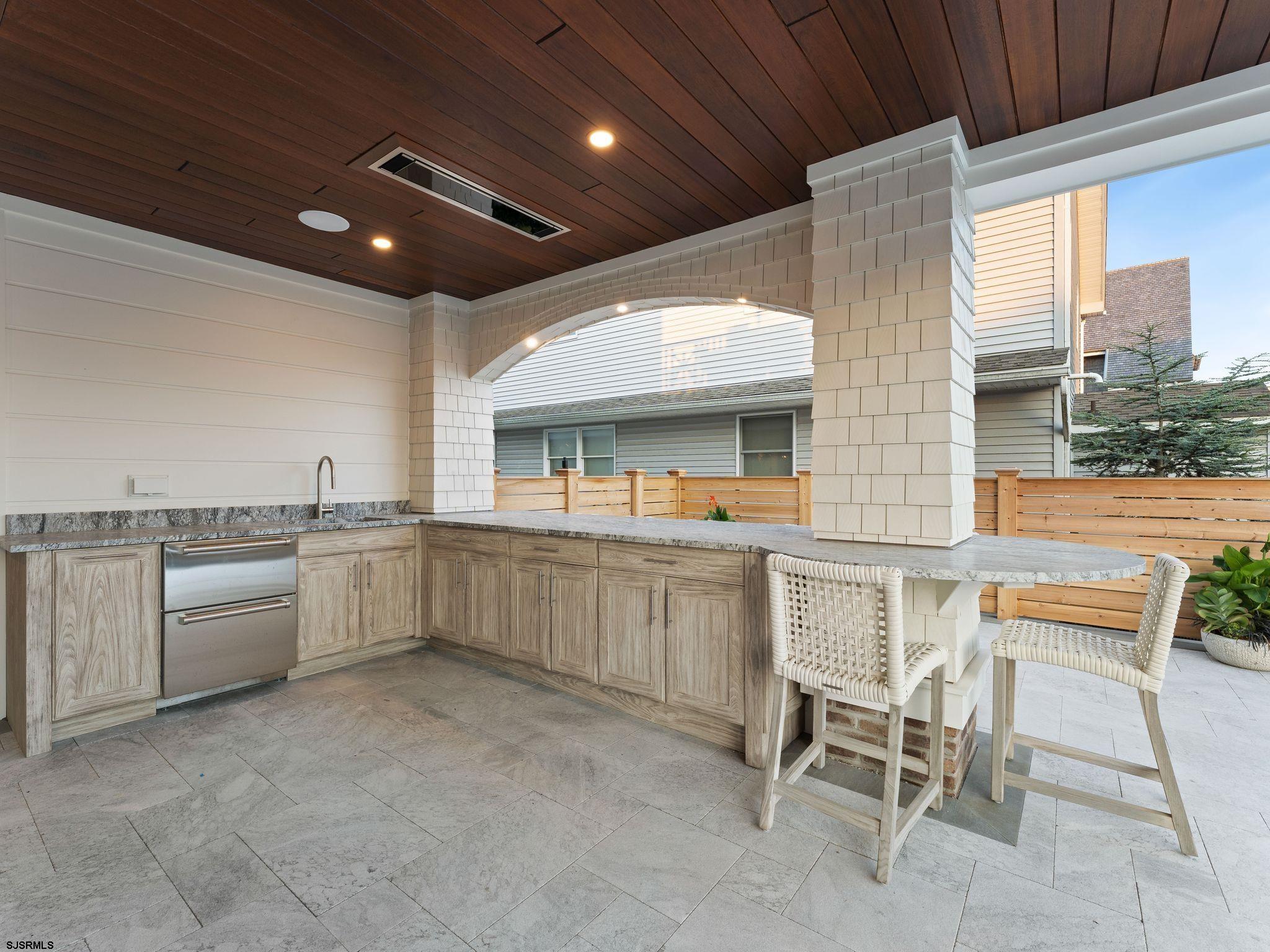 12 East Newcastle Road Ocean City, NJ 08226 - Photo 79 of 99 a large white kitchen with a large window