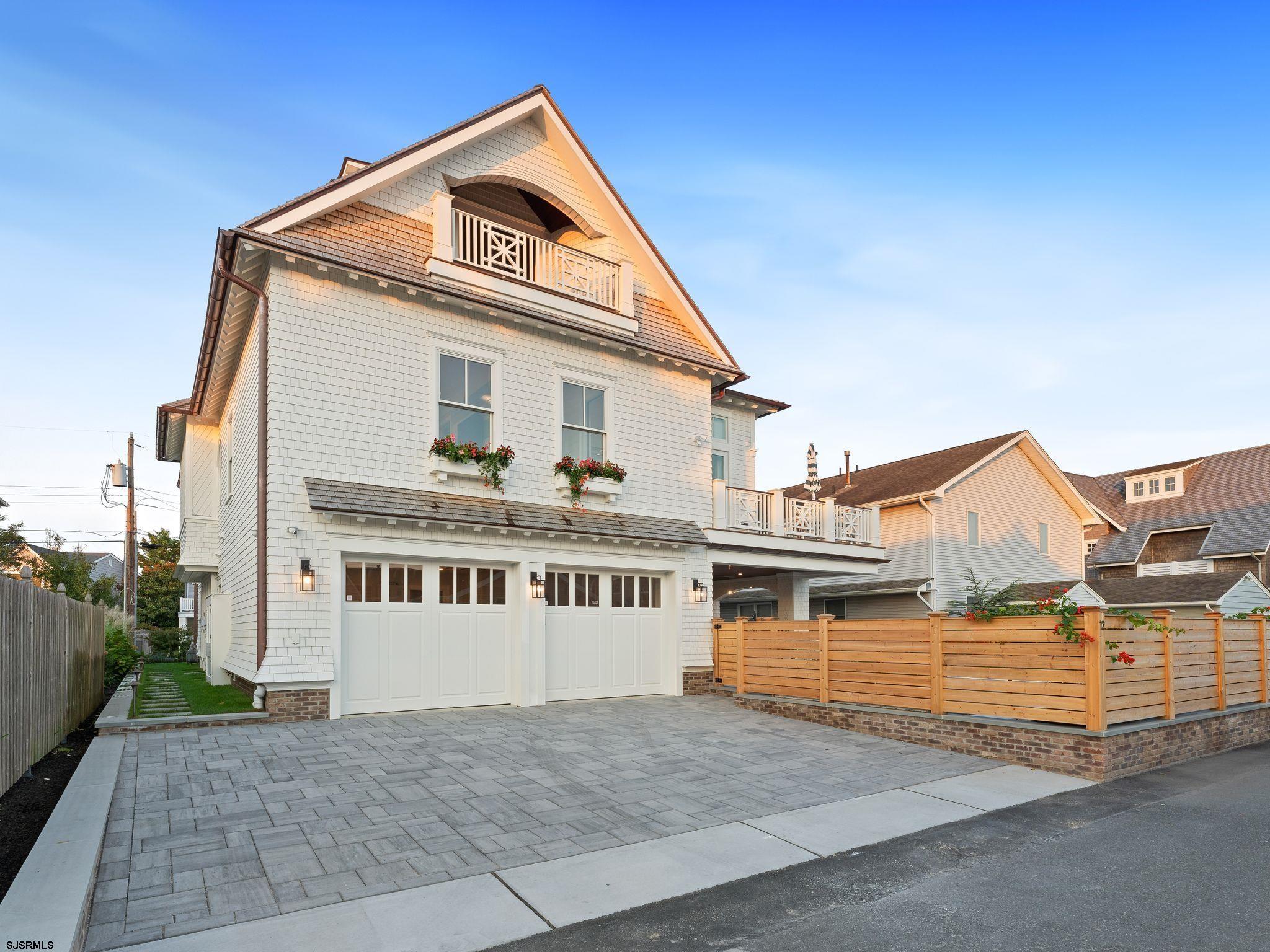 12 East Newcastle Road Ocean City, NJ 08226 - Photo 84 of 99 a front view of a house with a yard