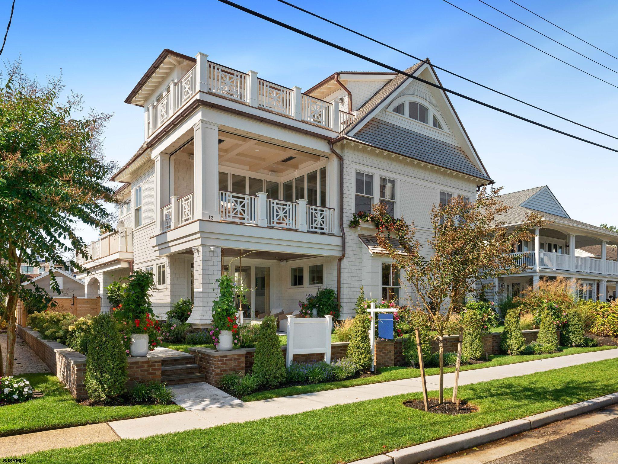 12 East Newcastle Road Ocean City, NJ 08226 - Photo 87 of 99 a front view of a house with a garden