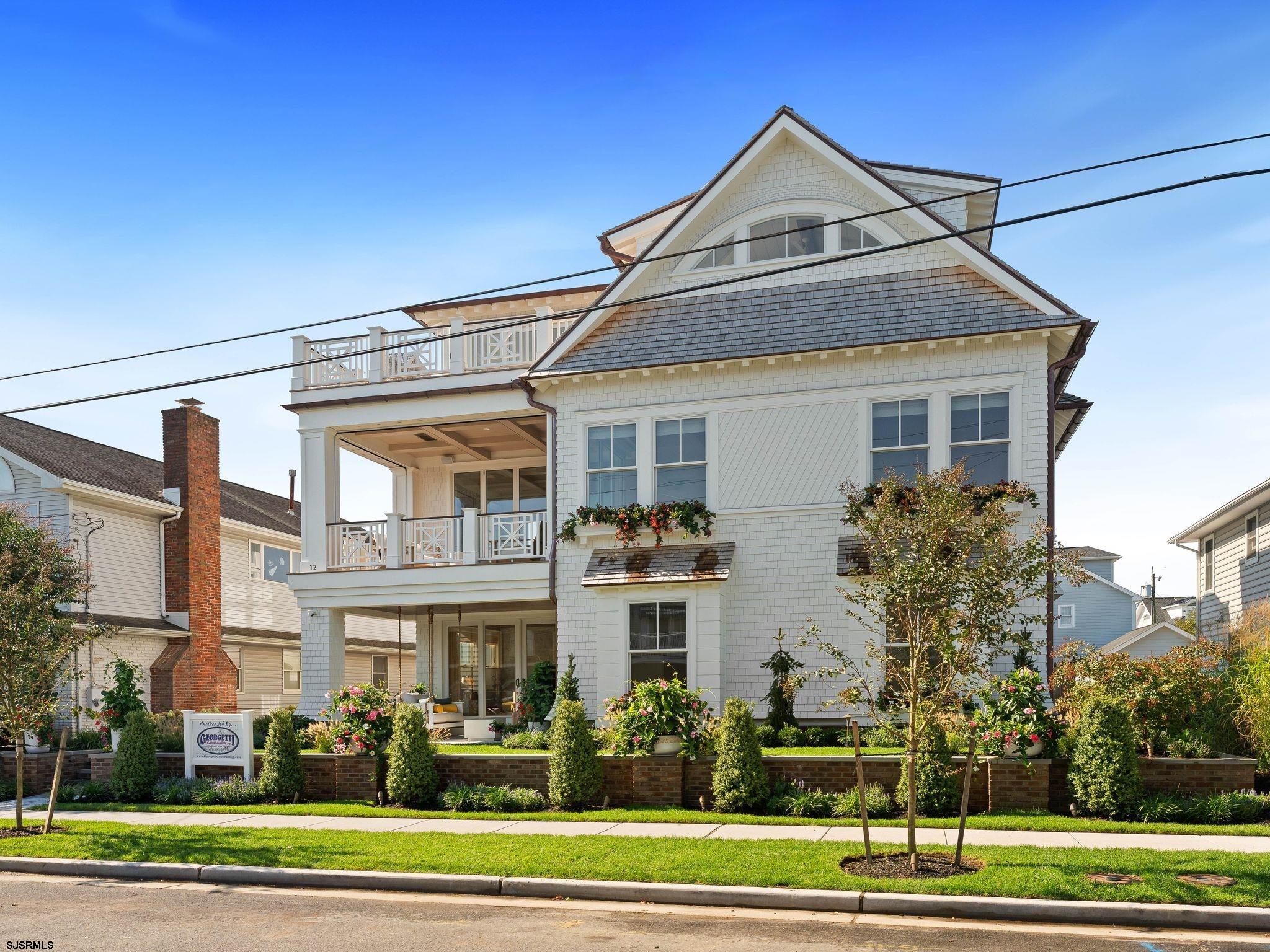 12 East Newcastle Road Ocean City, NJ 08226 - Photo 88 of 99 a front view of a house with a yard