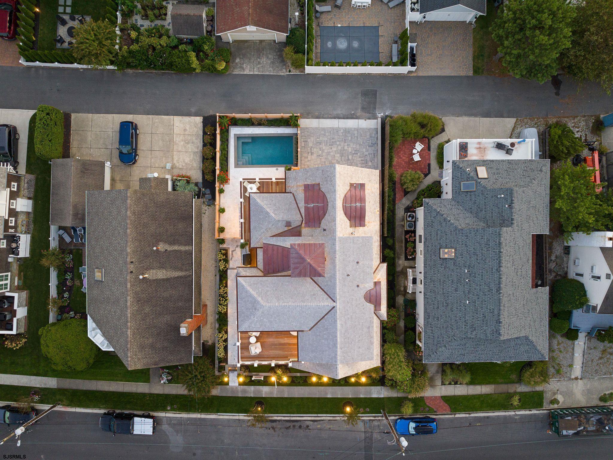 12 East Newcastle Road Ocean City, NJ 08226 - Photo 92 of 99 an aerial view of residential houses with outdoor space and parking