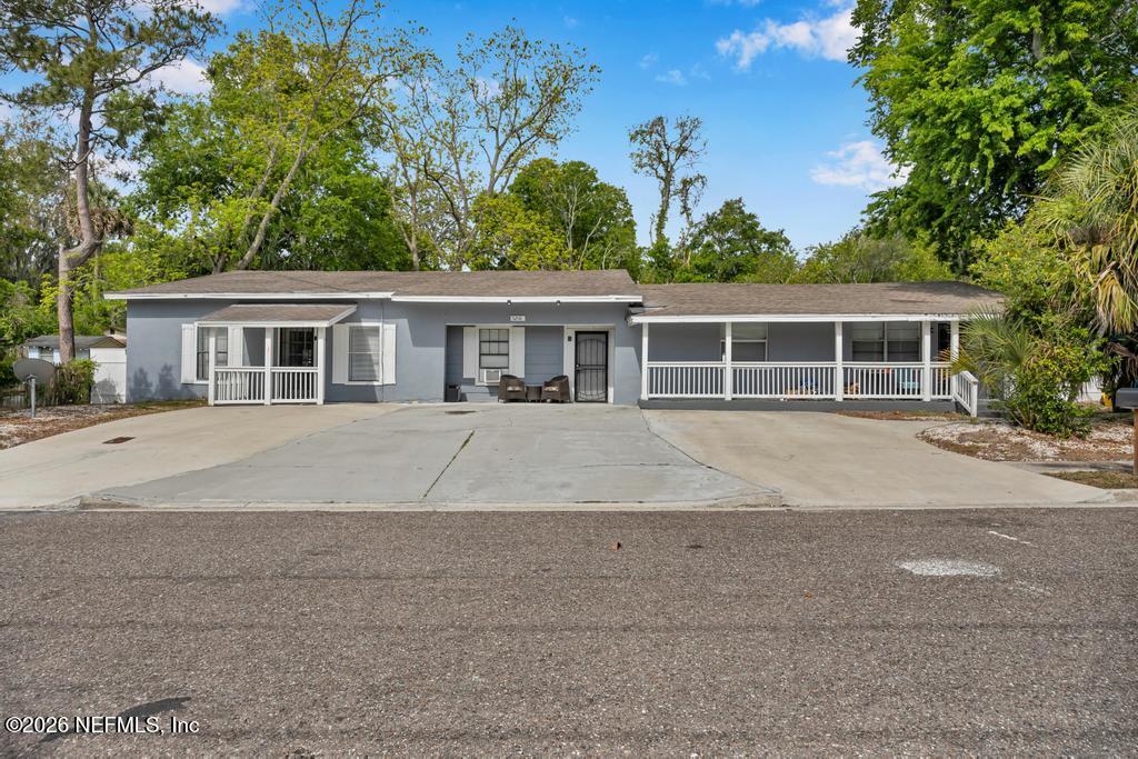 5210 Dodge Road Jacksonville, FL 32209 - Photo 6 of 42 front view of house with a yard