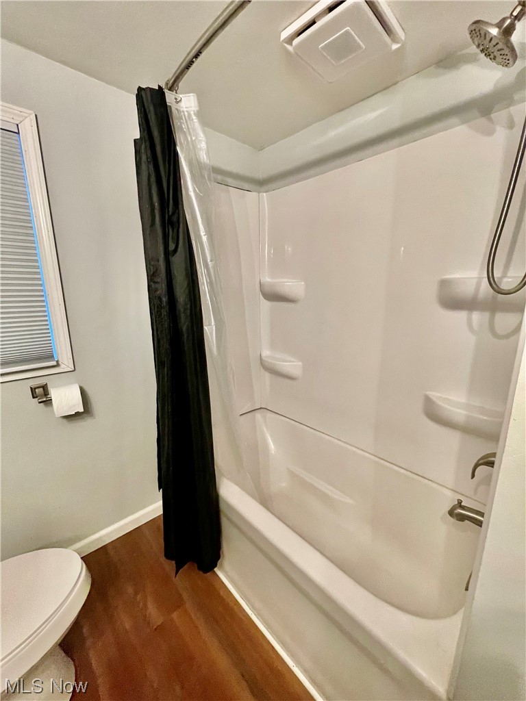 120 View Road Wellsburg, WV 26070 - Photo 16 of 27 Bathroom with toilet, shower / bath combo, and hardwood / wood-style floors
